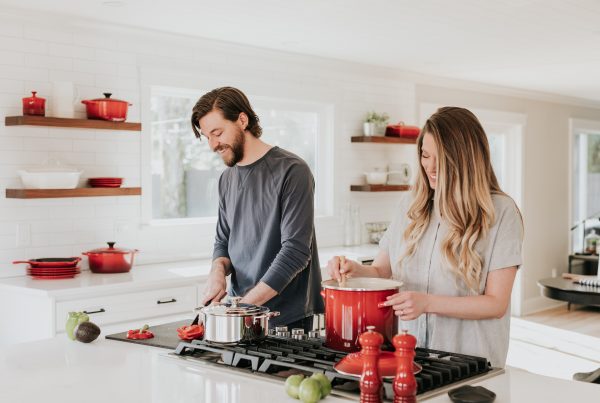 Photo of a young couple calculating home finances