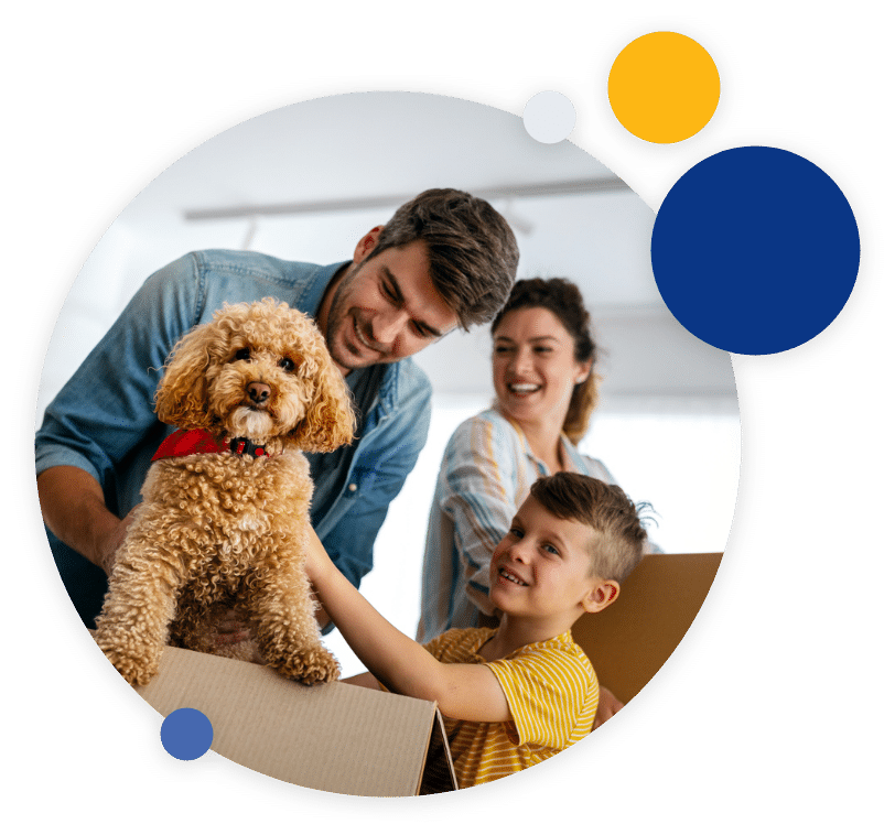 Happy family unpacking boxes in new home on moving day